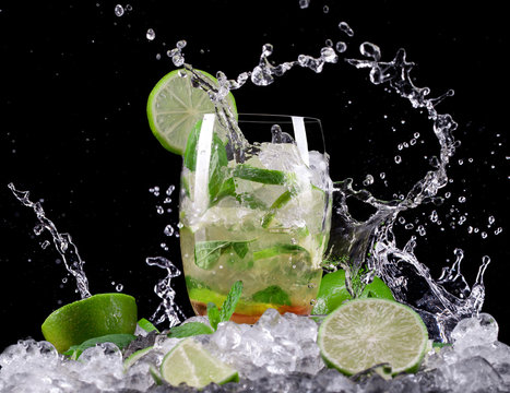 Mojito cocktail on black background