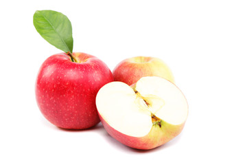 Naklejka na ściany i meble Fresh red apples with a slice isolated on white background.