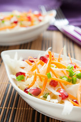 Salad with fresh cabbage with pomegranate