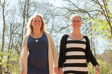 Naklejka premium Two young women having fun in nature.