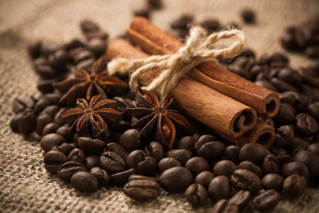 cinnamon rolls on the roasted coffee beans. macro