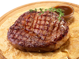 Rib-eye steak resting
