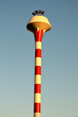 red and white water tower
