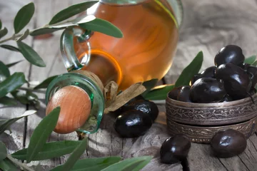 Foto op Plexiglas olive oil with olive branch © circleps