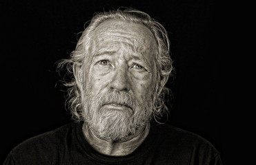 Fototapeta premium Worried black and whit image of senior man