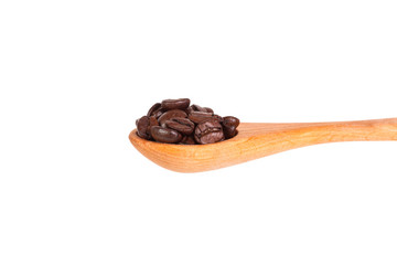 Coffee beans on wood spoon