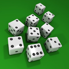 Scattered white dice on green beize