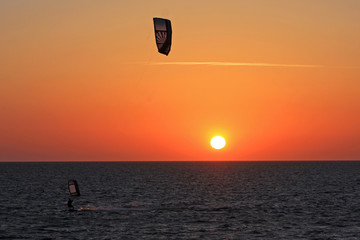 kitesurfer at sunset
