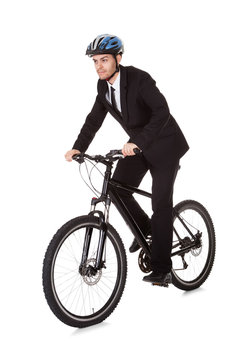 Businessman riding a bicycle
