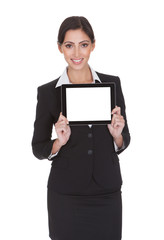 Smiling Businesswoman Holding Digital Tablet