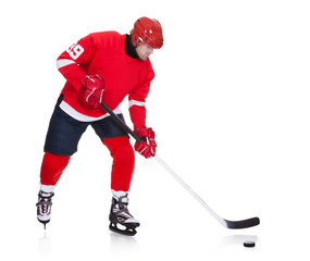 Fototapeta premium Professional hockey player skating on ice
