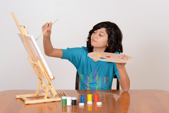 Young child painting