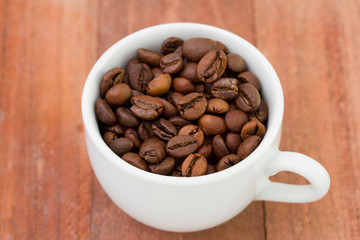coffee beans in white cup