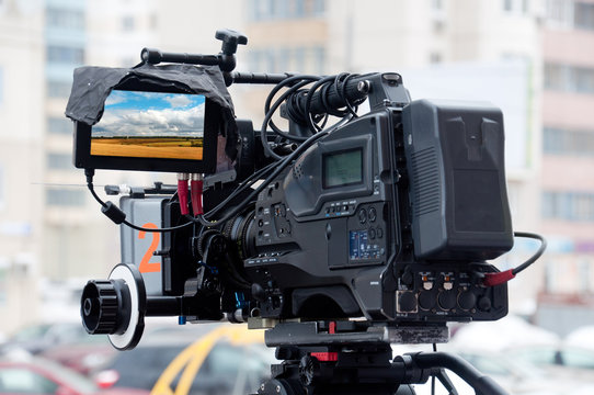 Professional video camera on a city street