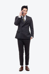 Asian business man with cellphone.