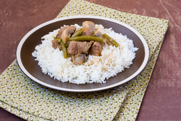 Beef with mushrooms, vegetables and rice