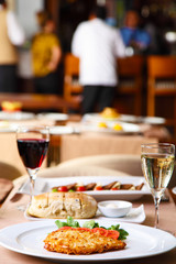 Luxury restaurant table with dinner served