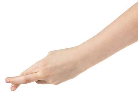 female teen hand with crossed fingers