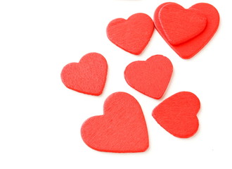 Fototapeta na wymiar group of red wooden hearts, symbol of love