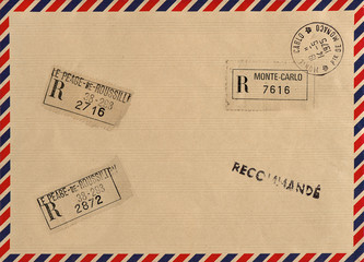 vintage airmail envelope with stamps