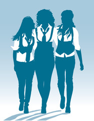 Silhouettes of teenage school girls walking together