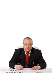 businessman sitting at desk with copy space