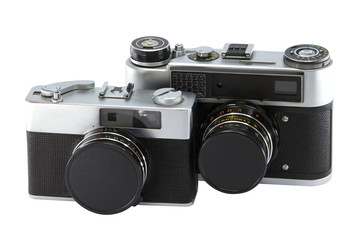 Two old film cameras. Big and small.