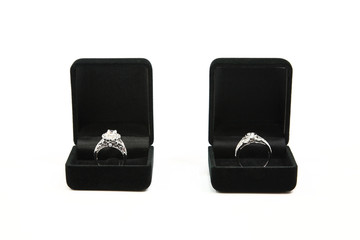 Couple wedding rings in a gift box isolated on white