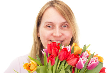 Obraz na płótnie Canvas Kobieta z tulipanami