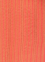 Fond textile rayé orange.
