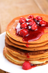 Delicious pancakes with raspberries