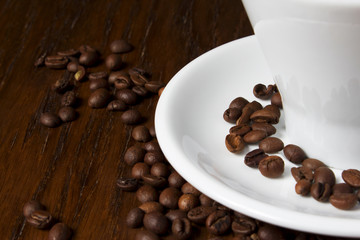Cup of coffee with beans