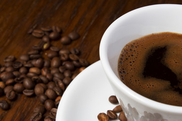 Image of coffee beans and white cup
