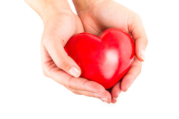 Fototapeta premium Heart in hands as love and health symbol