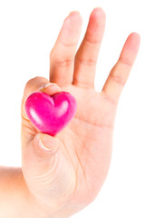 Fototapeta premium Heart in hand as love and health symbol