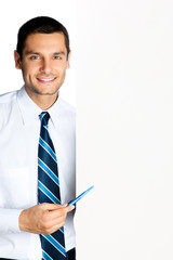Happy businessman showing signboard, isolated