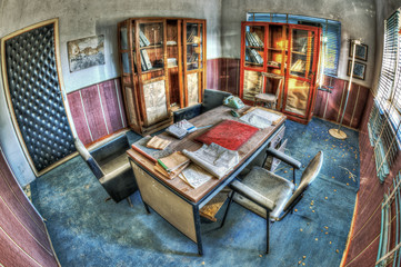 Old forgotten desk in an abandoned office