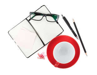 Coffee cup and office supplies