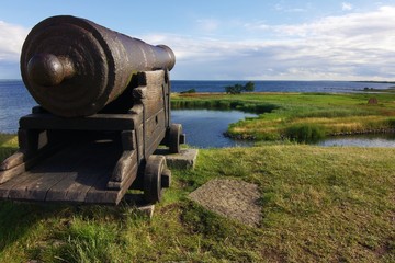 Ancient cannon aimed at the sea in the Kalmar castle, Sweden. © yurephoto