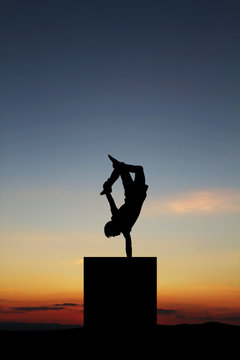 handstand in sunset