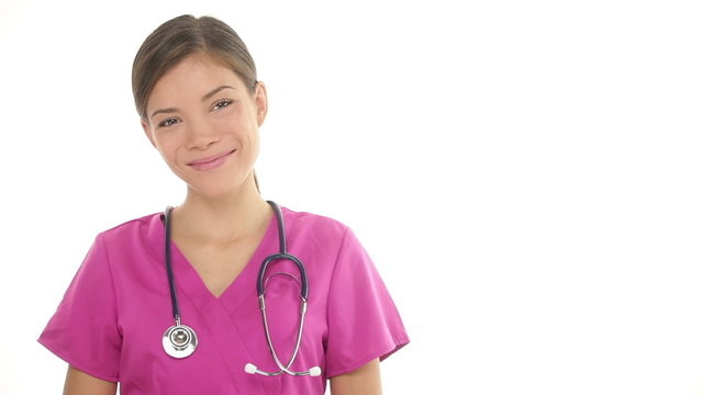 Medical nurse or young doctor smiling happy portrait