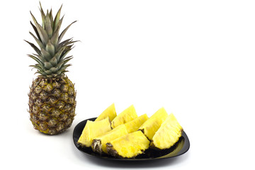 Fototapeta na wymiar pineapple with slices isolated on white