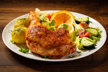 Grilled chicken leg with vegetables