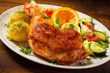 Grilled chicken leg with vegetables