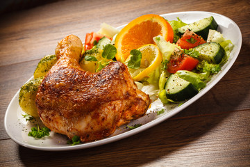 Grilled chicken leg with vegetables