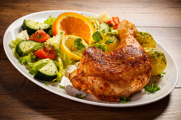 Grilled chicken leg with vegetables