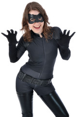 Junge Frau in Superhelden-Kostüm