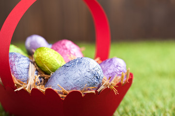 Red basket with Chocolate Easter eggs