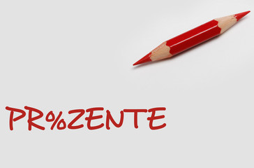 Rotstift mit Prozentzeichen.