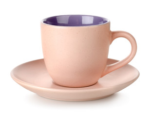 Pink cup and saucer isolated